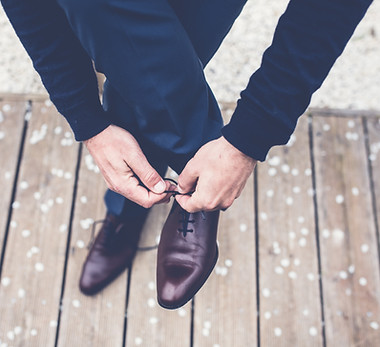 Man Tying Shoelaces