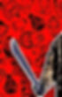 Jason Vorhees arm, holding a machete against a red wallpaper adorned with line drawn illustrations of severed hands and head