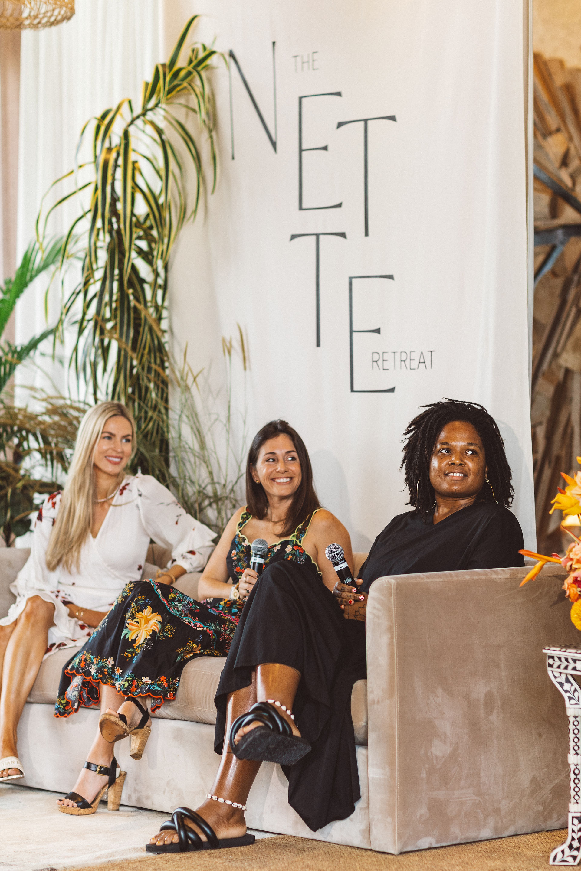 Women founders smiling during their keynote at the Nette Retreat in Mexico