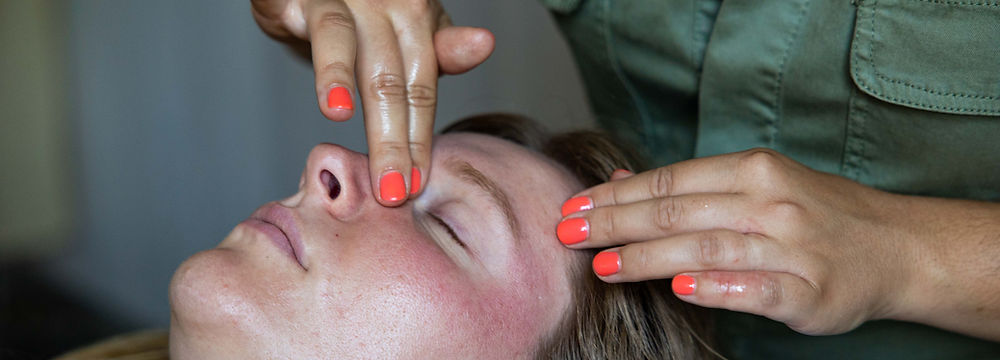 Dropper dispensing oil onto skin for skincare treatment. Hydration Boost. My Site