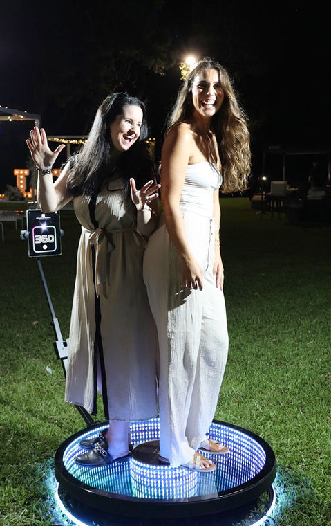 Rotating photo booth in action at outdoor event