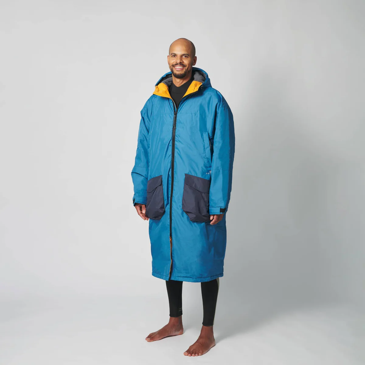 This change robe is light blue and to the knees. It's warm and great for changing out of a wet bathing suit.