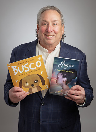 Robert showing his published books