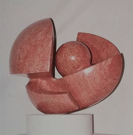 “Perla rossa” – 1976, travertino rosso di Persia, cm 45x50x50