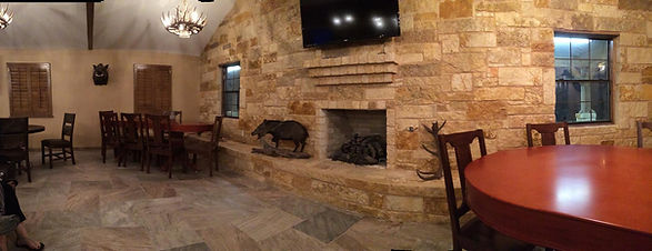 Decoration and fireplace in the lodge area, Thompson Hunting Lodge