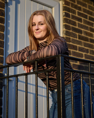 Outdoor photo of a young woman using only the evening sun. The colour, light and shade of her amazing hair is complimented by the tiger stripes on her top and colour of the bricks behind her.  Late evening is great for amazing photos. 

#kentphotographer
#gravesendphotographer
#dartfordphotographer
#ebbsfleetphotographer
#ukphotographer 