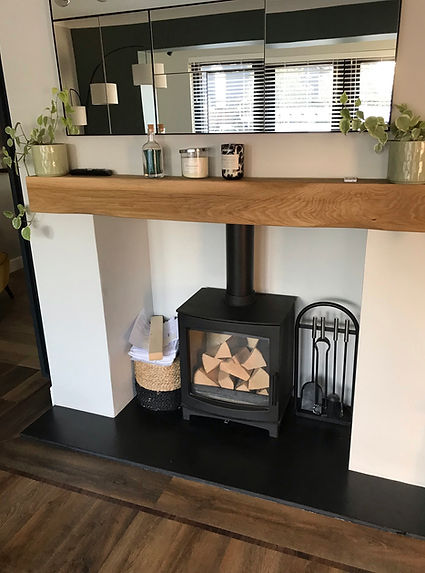 mi fires with chunky oak beam and slate hearth.JPEG