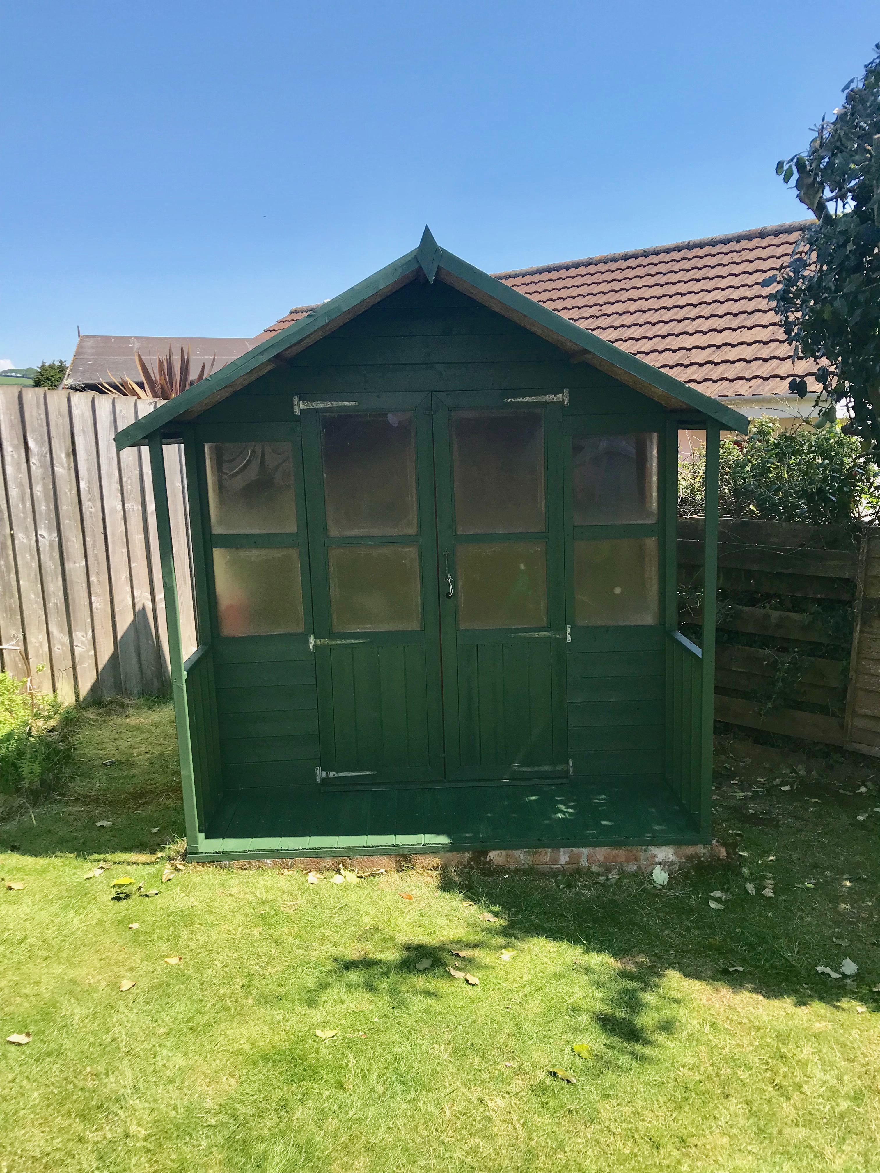 Re-roofing and painting shed