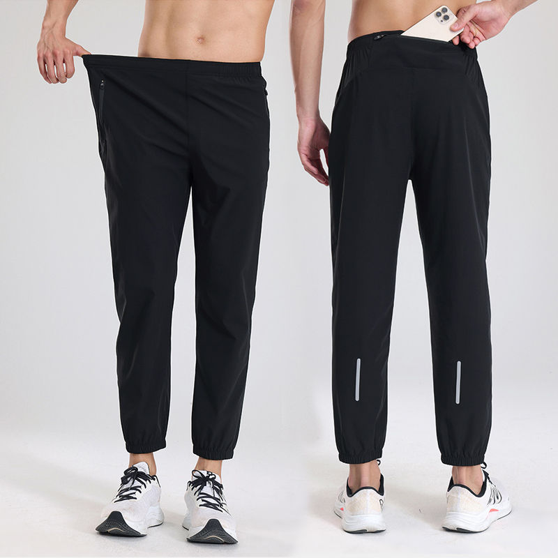 サムネイル： 男性が黒いスポーツパンツを着用。メンズ速乾性ジッパー長袖スポーツTシャツ ランニングフィットネス通勤カジュアルウェア