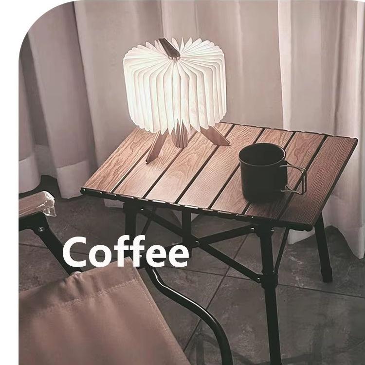 Thumbnail: Coffee on table, lit lamp, text "Coffee". Wooden table indoors, cafe setting.