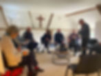Guests gathered for a venue hire in the meeting room at The Wellspring Ledbury.