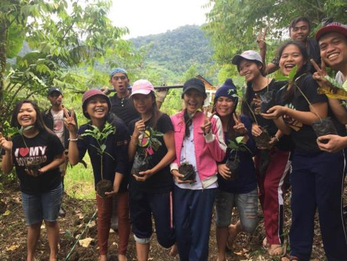 youth with seedlings.jpg