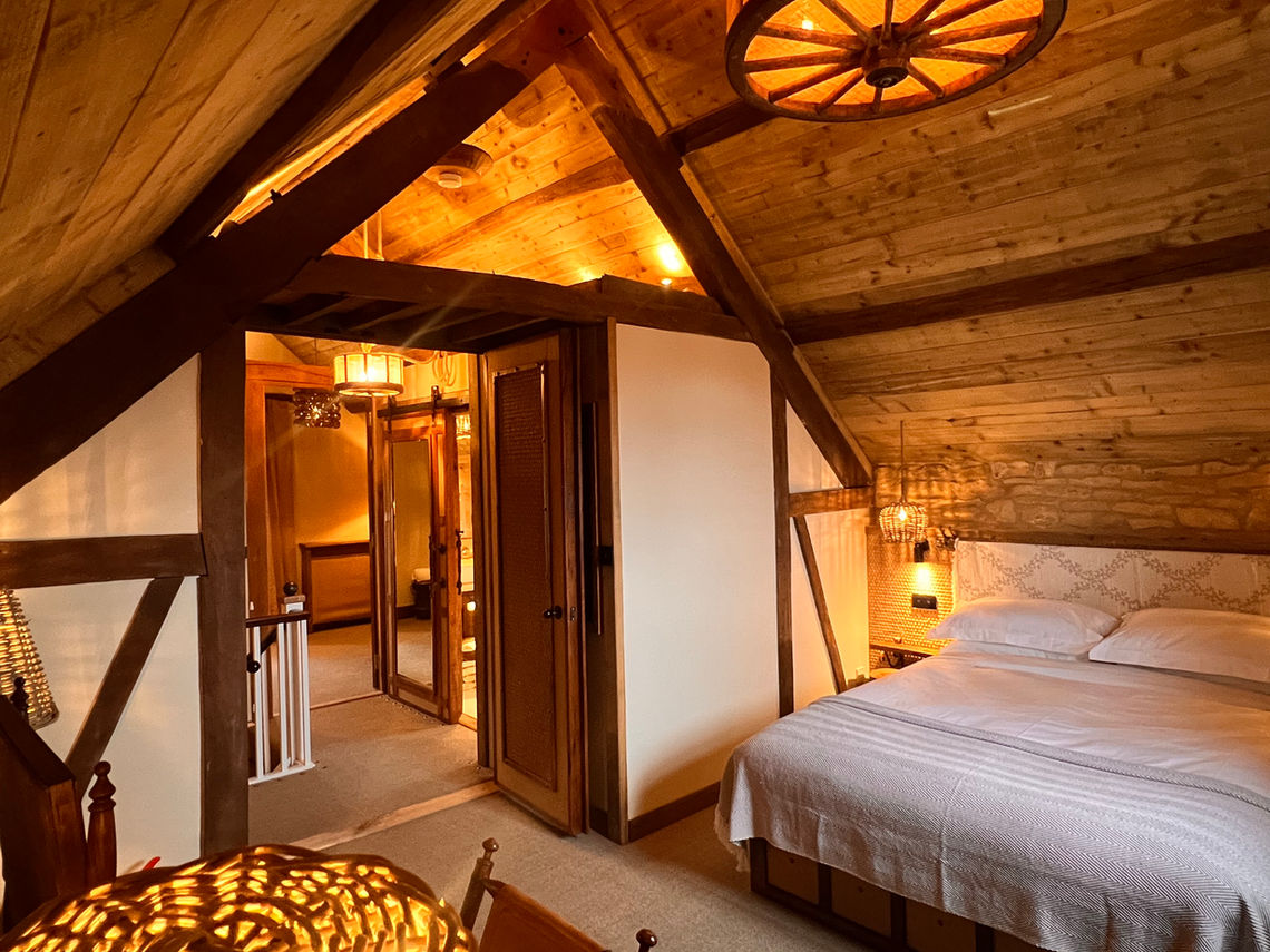 Luxury master bedroom at Dovecote Churchill Oxfordshire. High-spec 950 sqft (88 sqm) guest suite near Kingham and Chipping Norton. Highest rated 10/10 accommodation in the Cotswolds.