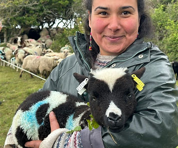 Yannine holding a lamb