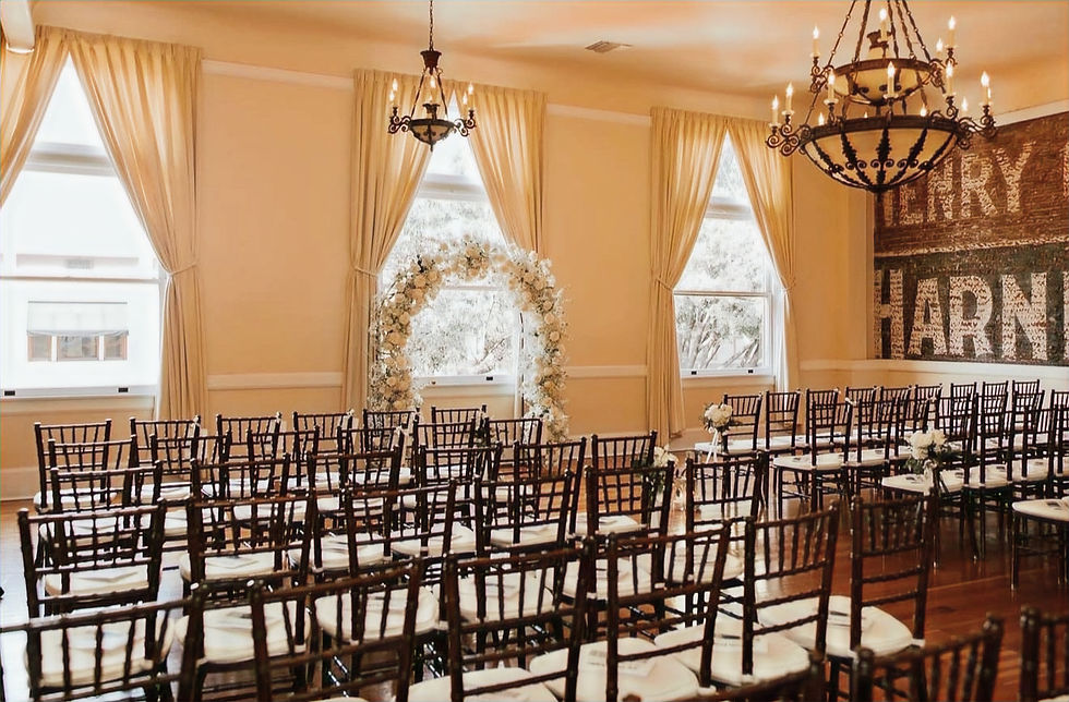 Historic wedding venue with windows and chandelier