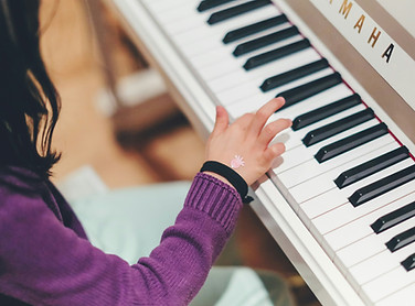 child hand at keys.jpg