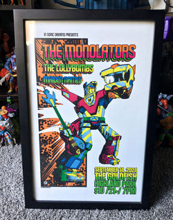 The Monolators return poster
