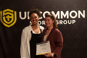 Laura posing with a USG staff member