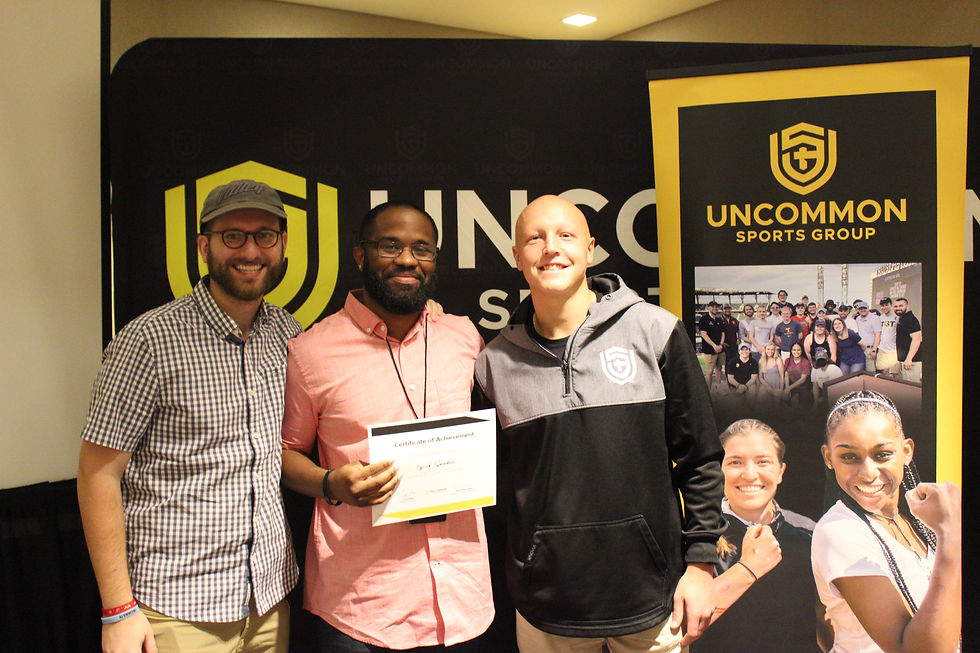 Ezrick showing off his USG Academy certificate.