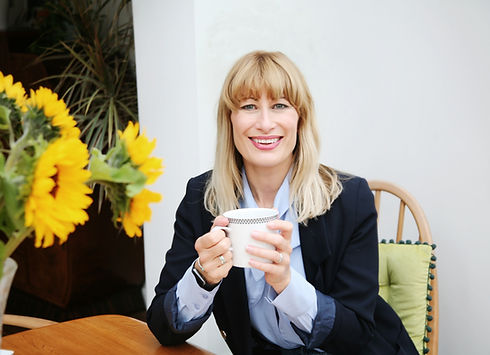 Personal branding photo shoot for female entrepreneur working on laptop, Portsmouth South Coast.
