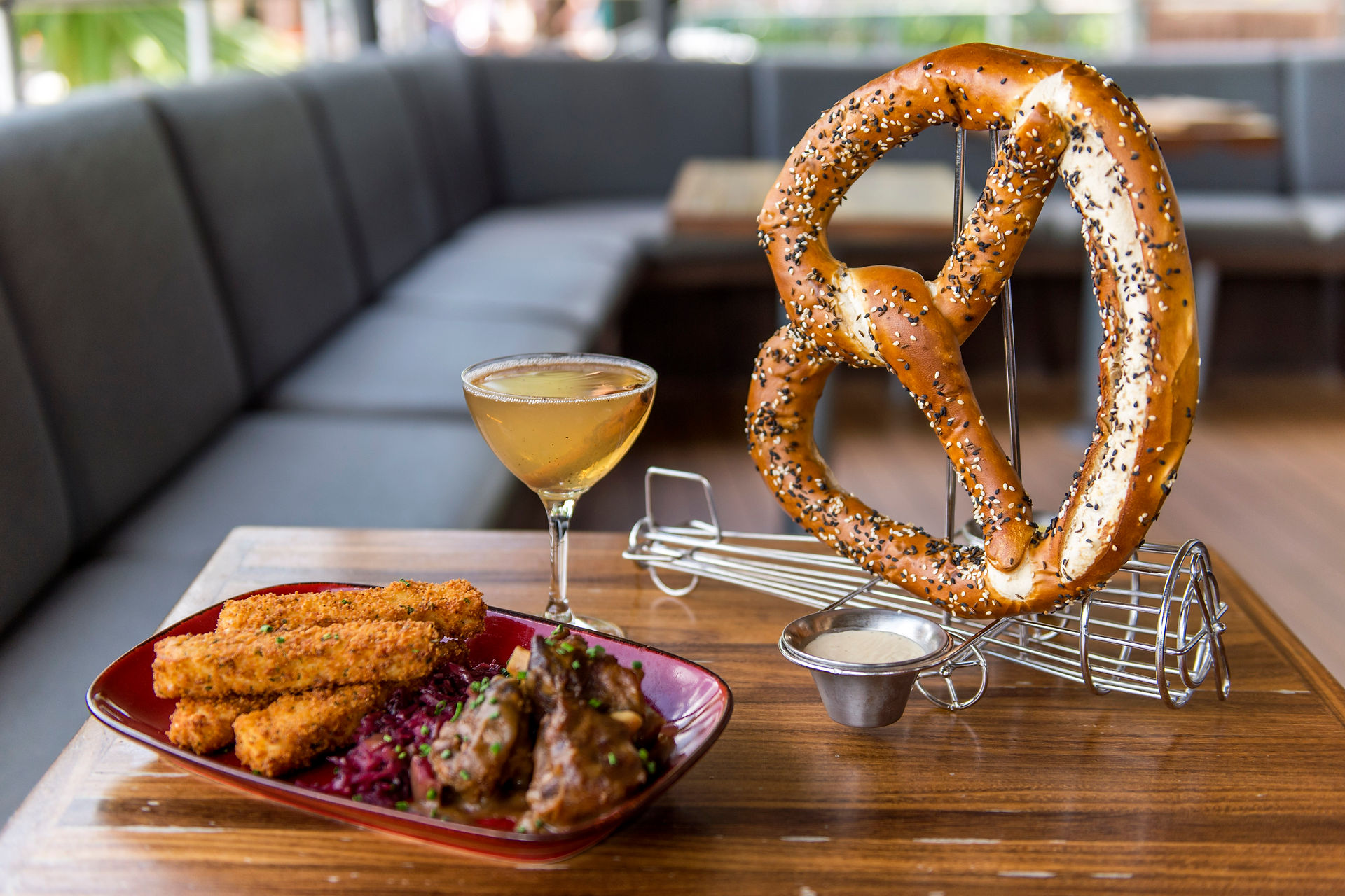 pretzel and wine glass on a table