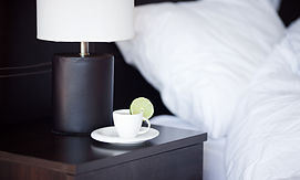 Hotel bedside table with tea