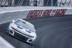 Camaro hugging a turn.