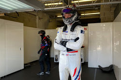 Cooper standing on pit road.