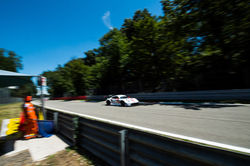 Porsche coming across the starting line_
