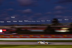 Ferarri racing on a straight away.