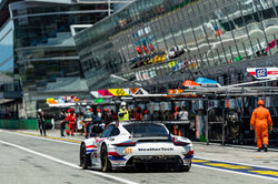 Porsche pulling out of the pit.