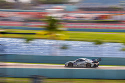 Ferarri practicing on the straight away.