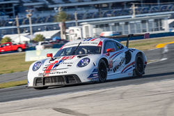 Porsche rounding a turn_