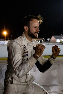 Driver celebrating win.