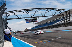 Porsche crossing the finish line.
