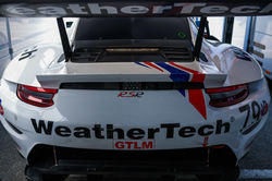 Rear view of the Porsche.