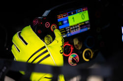 Steering wheel of the Porsche.