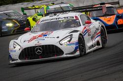 Mercedes driving on the track.