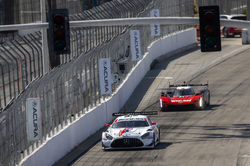 Mercedes leading down a straight.