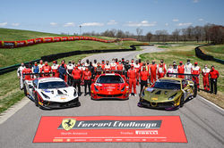 Crew and cars on track.