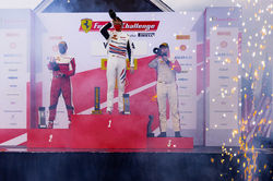 Cooper celebrating on the podium.