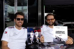 Drivers signing autographs_