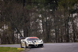 Ferrari rounding a turn.