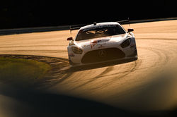 Mercedes rounding a curve.