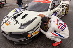 Cooper checking the brakes.