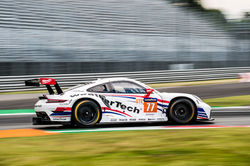 Porsche rounding a curve_