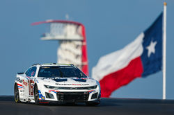 Camaro driving past the observation deck.