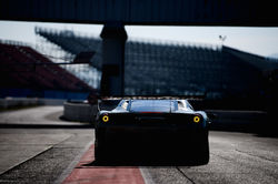 Rear view of the Ferrari near dusk.