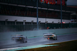 Ferrari racing in the rain.