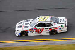 97 Camaro rounding a turn.